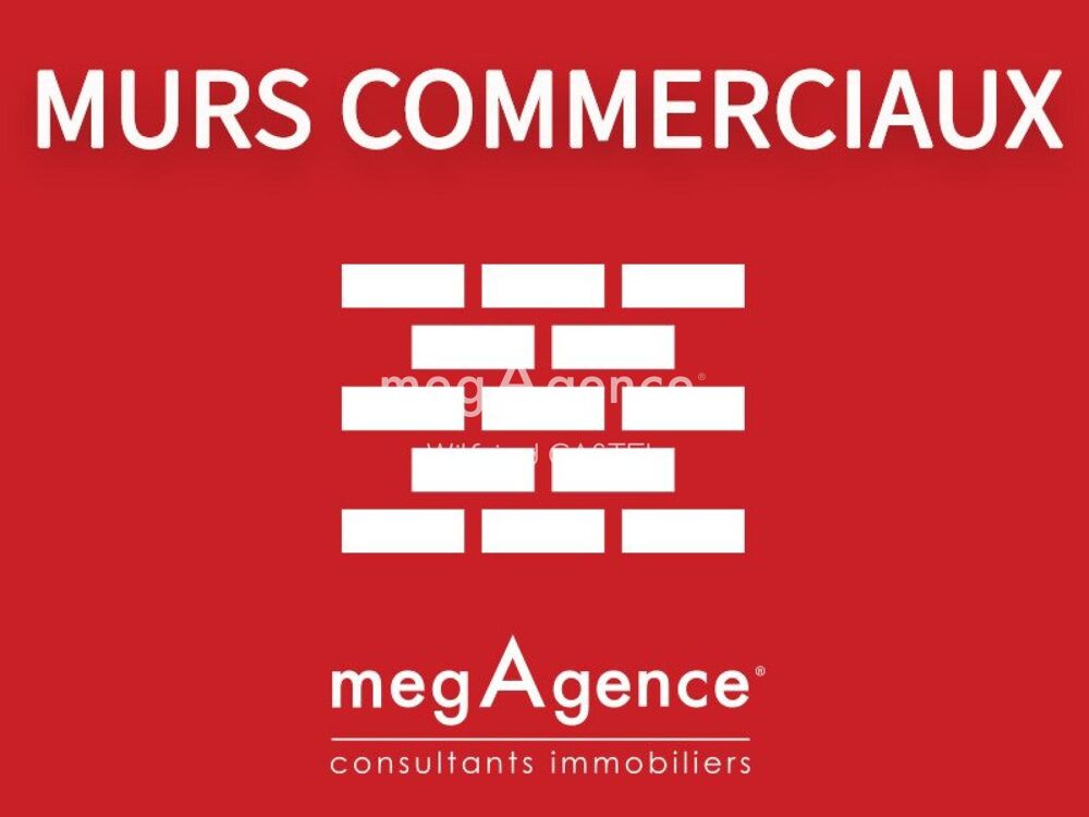   MURS COMMERCIAUX DE 300M2 AVEC PARKING PRIVE 