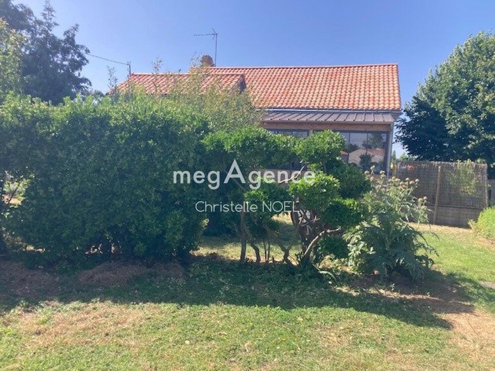 Maison sur sous sol,entouré de verdure,terrain constructible
