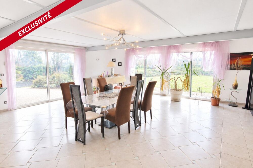 MAISON ATYPIQUE SUR UN TERRAIN DE 2 Ha 19a 33ca