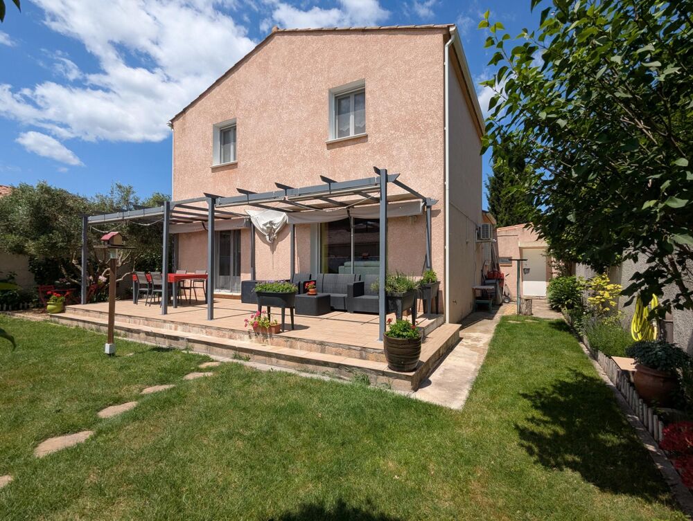 Maison familiale 5 pièces de 125 m² à REDESSAN  DPE A/A Terrain 643 m² avec piscine