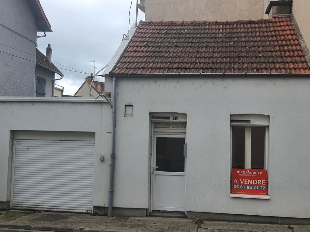 Maison de ville de type F2 bis .