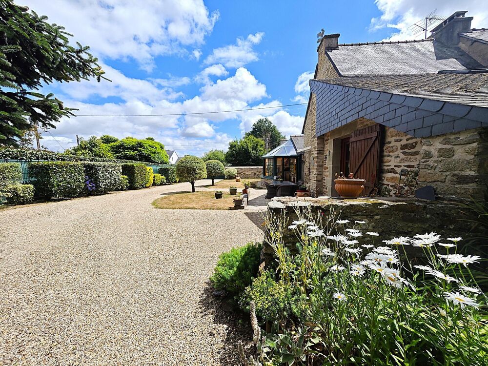 Maison en pierre avec double garage