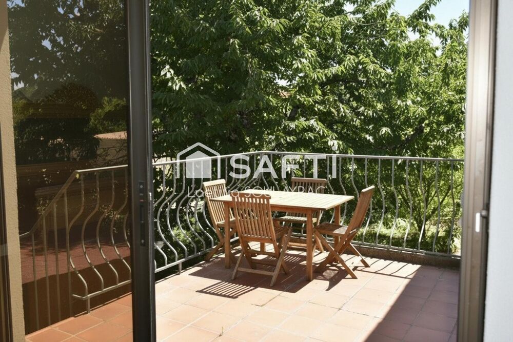 Maison 110 m² avec grand garage et jardin.