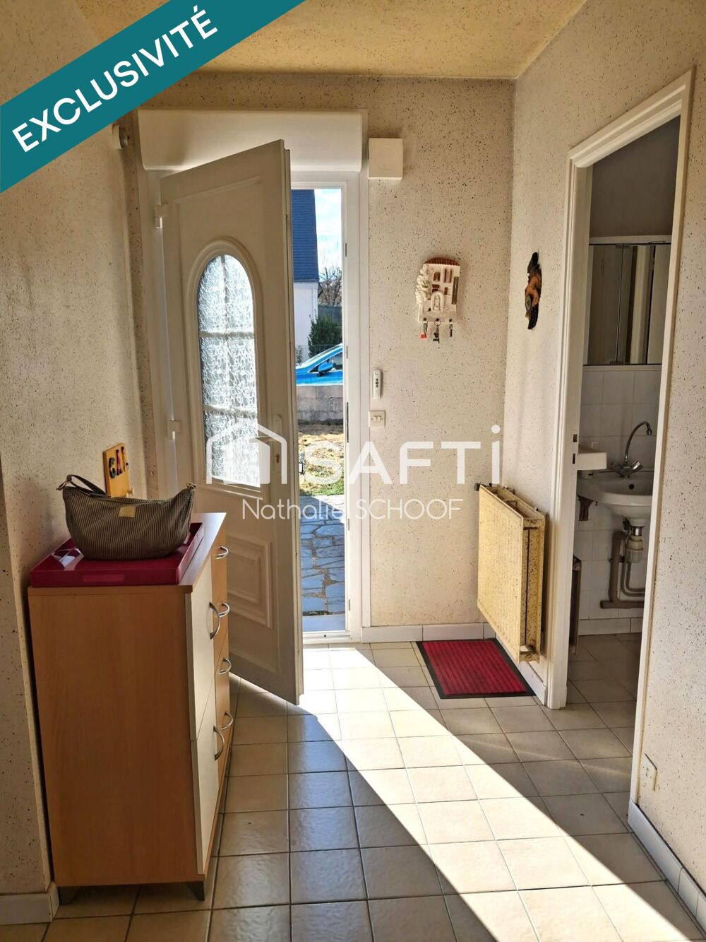 À vendre  Maison avec jardin et garage au coeur de Baud