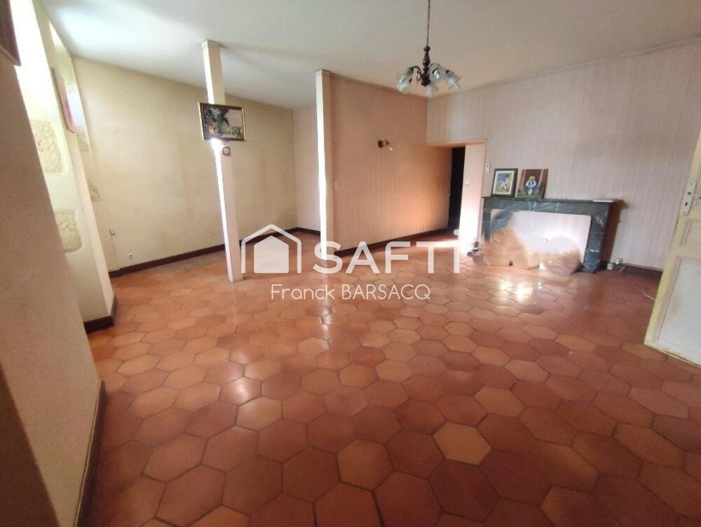 GRAND APPARTEMENT EN REZ DE CHAUSSEE AVEC JARDIN