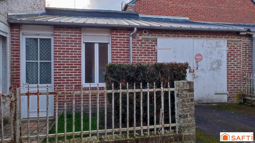 Maison mitoyenne avec travaux à réaliser, idéale pour famille ou investisseur.
