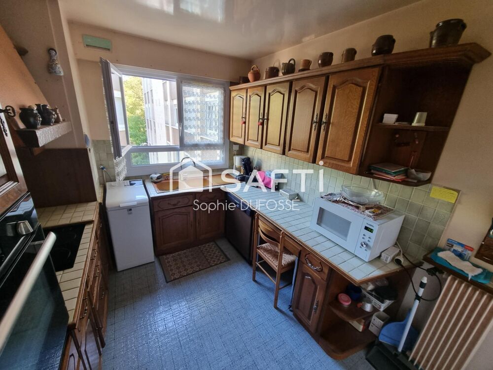 Proche commerces et gare, Appartement T3 de 63,02 m2 avec balcon filant, cave et place de parking intérieure