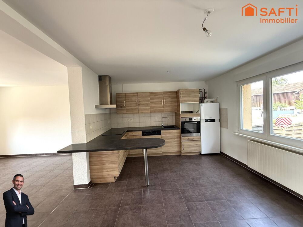 Superbe appartement de 3 pièces au RDC, disposant de 2 places de stationnement privées et 2 caves !
