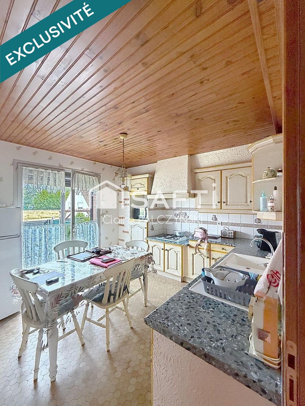 EXCLUSIVITÉ SAFTI  Maison de 98 m² avec jardin, garage et sous-sol complet