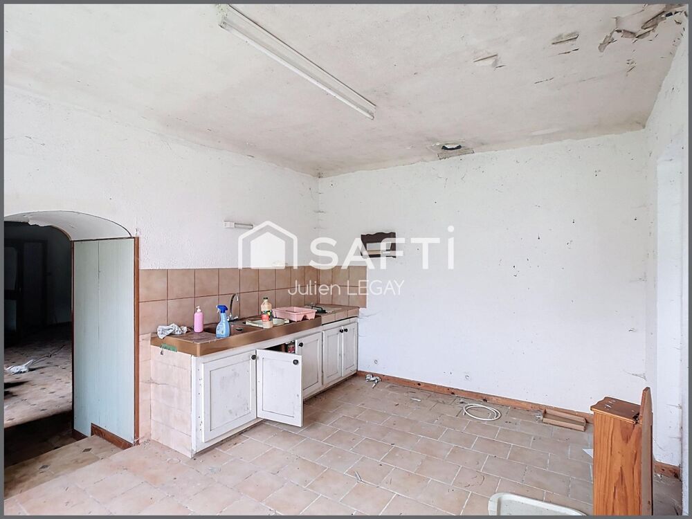 MAISON A RENOVER AVEC BEAU POTENTIEL, GARAGE ET JARDIN