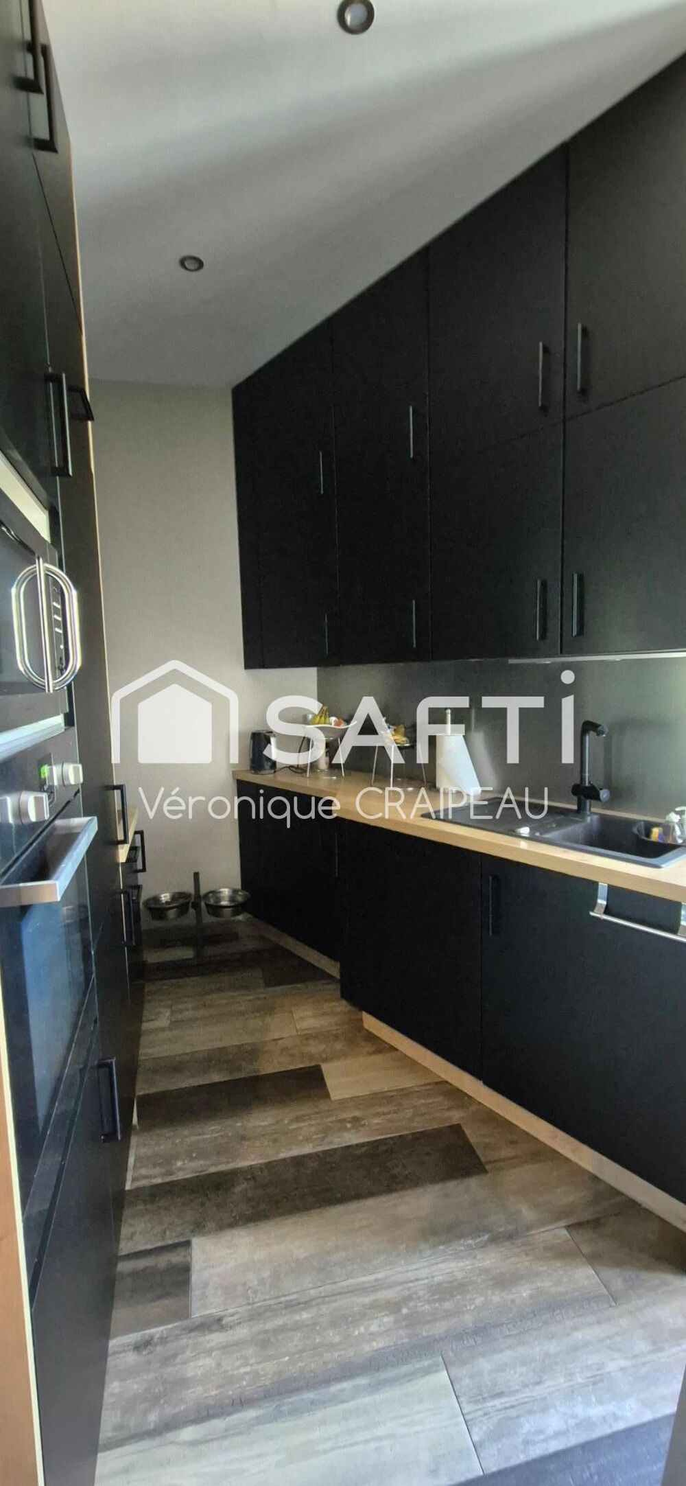 Appartement Type 4 de 94m²en centre ville avec cave et garage.