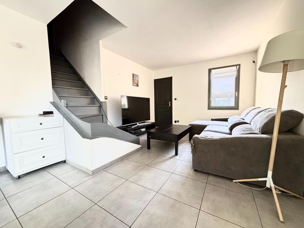 Maison semi individuelle avec garage et jardin