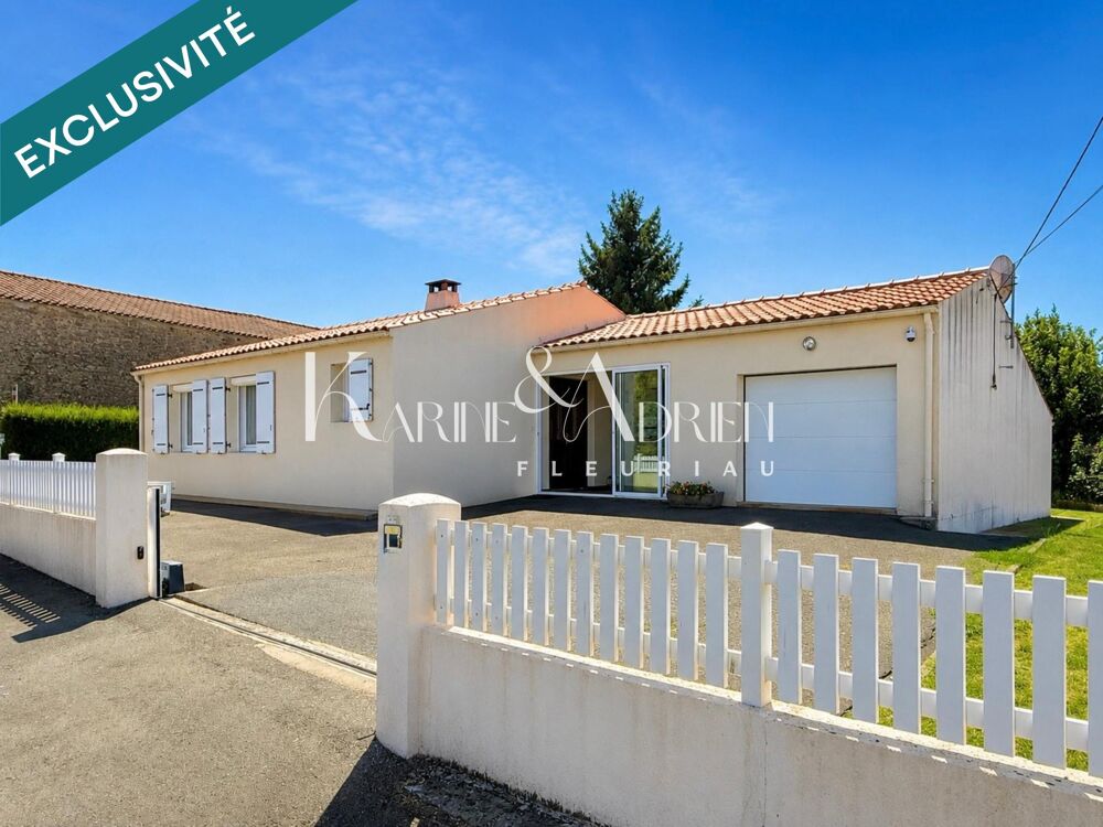 Maison de plain-pied 2 chambres, véranda, garage, dépendance et jardin clos