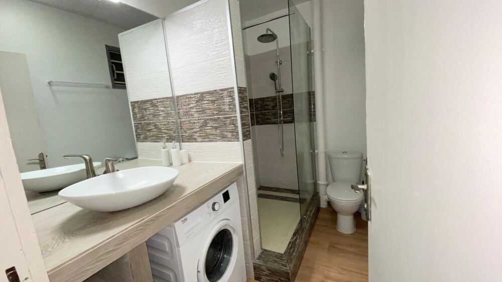 APPARTEMENT T2 MEUBLE AU RDC AVEC JARDINET
