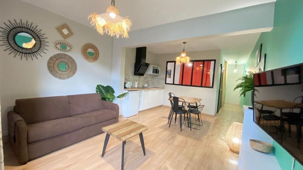APPARTEMENT T2 MEUBLE AU RDC AVEC JARDINET