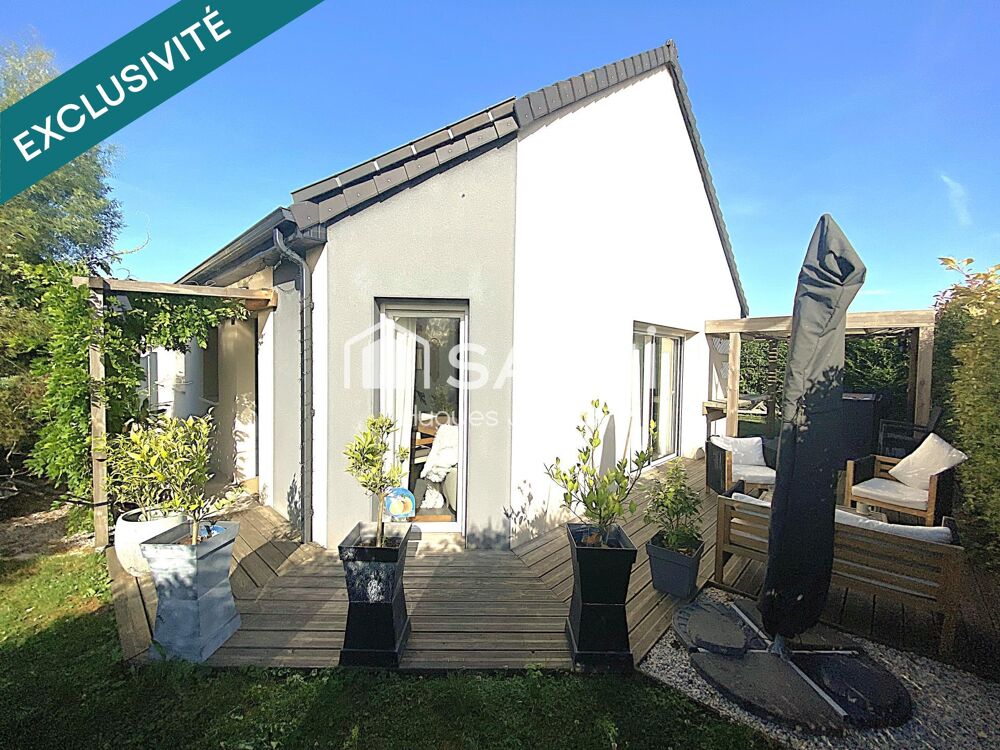 Maison récente de plain-pied avec 4 chambres, un jardin clos arboré et garage
