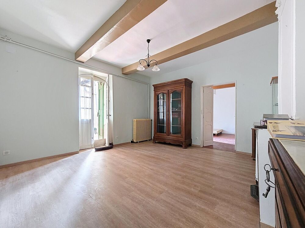 Appartement T3 de 77 m² avec caves voûtées et jardin collectif  Graissessac