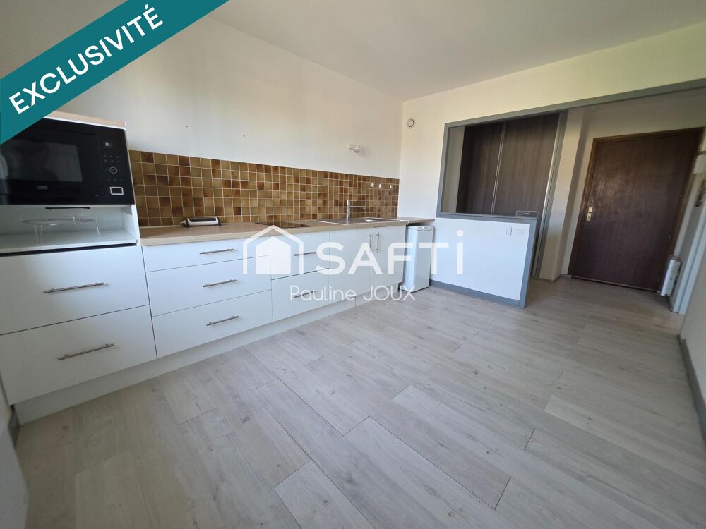 Appartement type F2 avec balcon, garage, cave et grenier