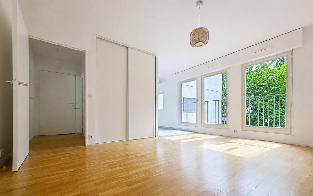 Vente Appartement AU PIED DU CANAL AVEC UNE VUE ARBOREE Paris 19