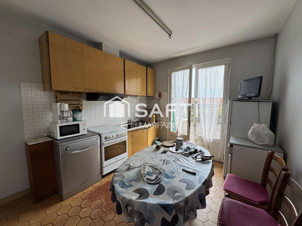 Double logement possible, jardin et garage