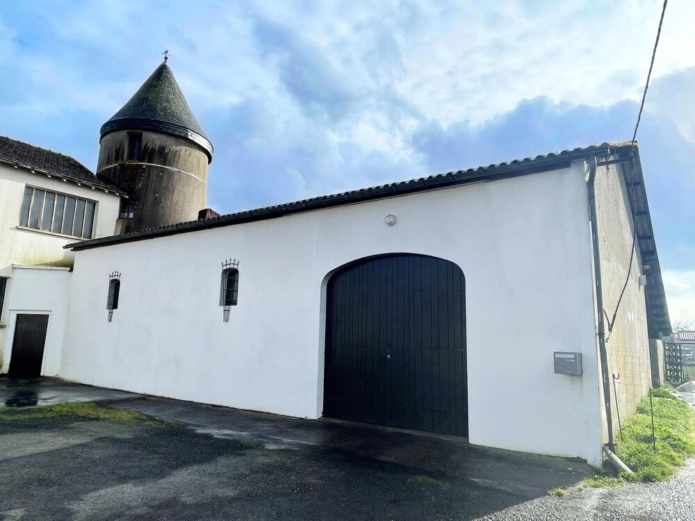 Hangar de 250 m² avec ancien moulin  Fort potentiel