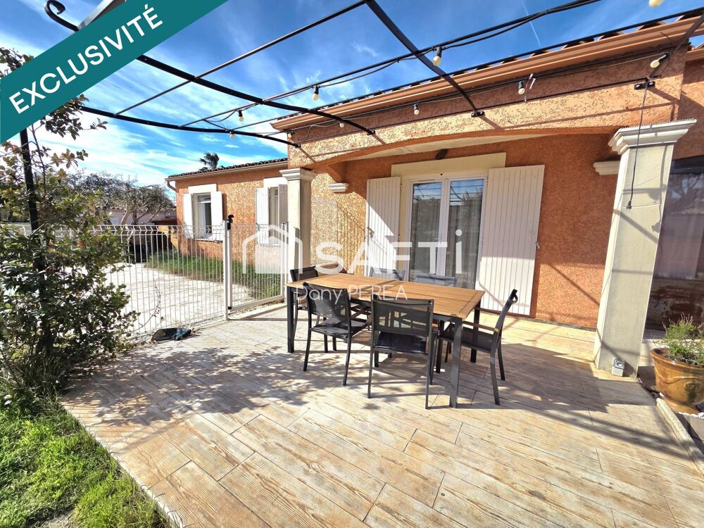 Villa avec piscine, jacuzzi, jardin et garage.