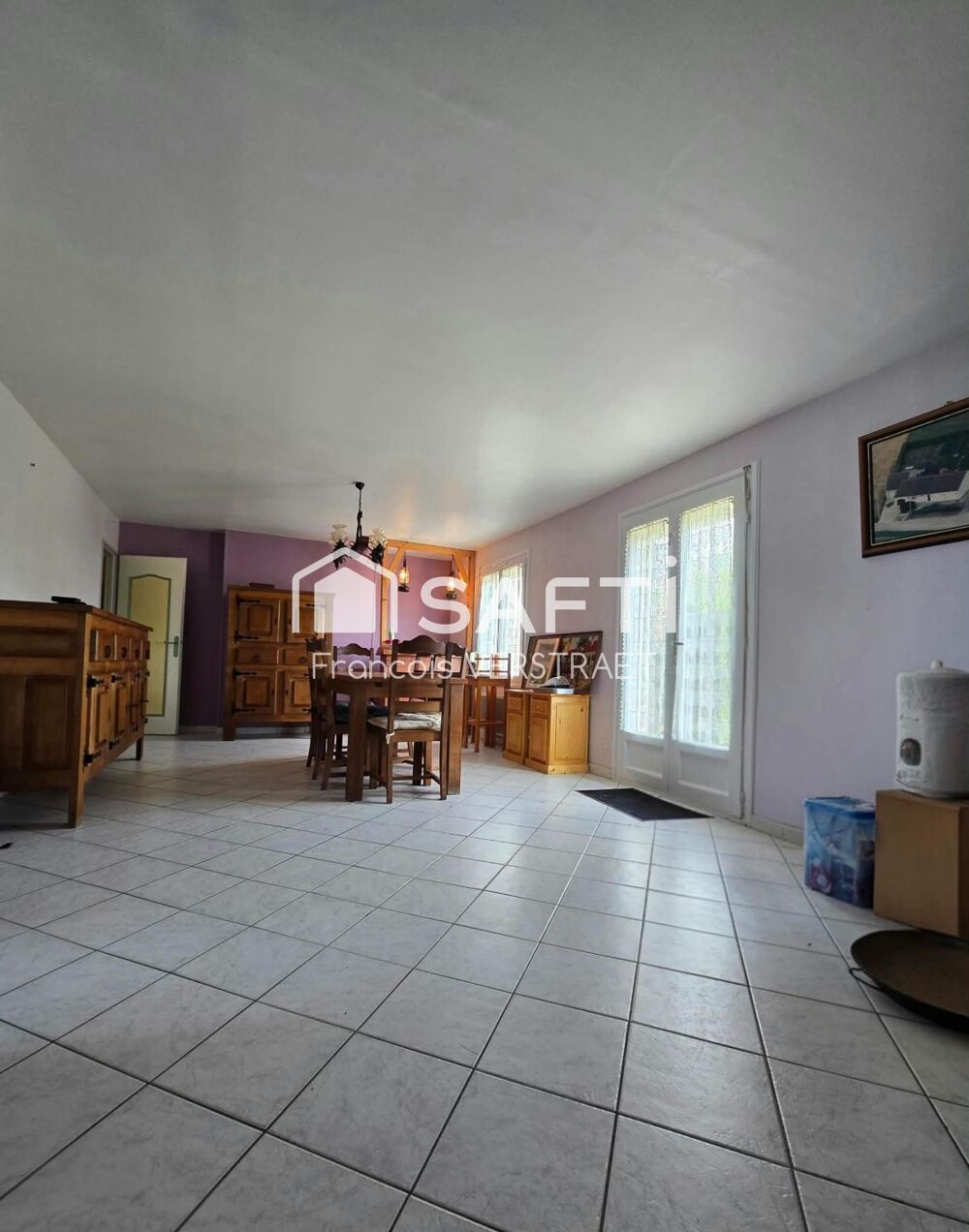 Maison individuelle de plain pied , garage , grand jardin