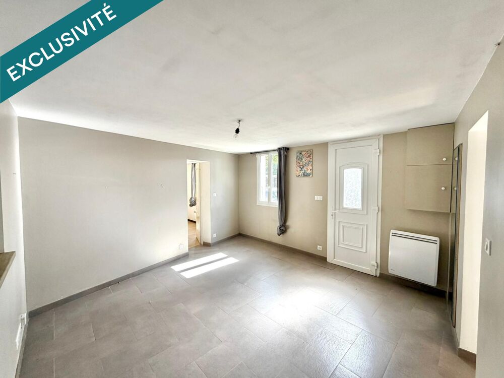 MAISON DE VILLE AVEC JARDIN PROCHE COMMERCES