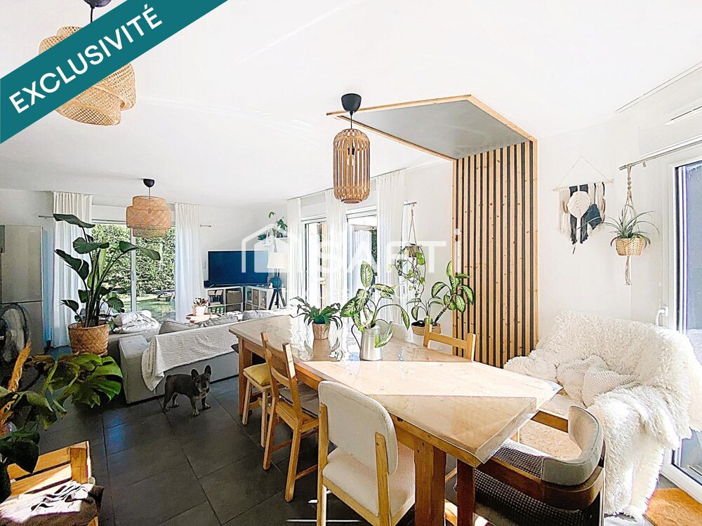 Maison récente de plain-pied avec 4 chambres, un jardin clos arboré et garage