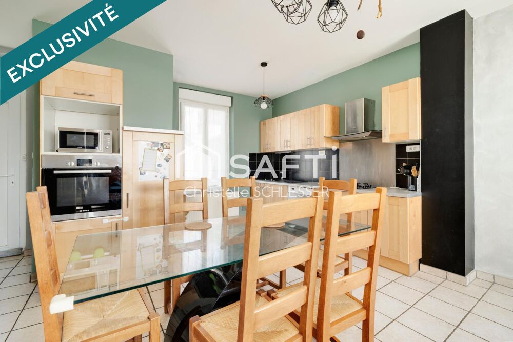 Maison mitoyenne lumineuse de 95 m² avec jardin  Clé en main