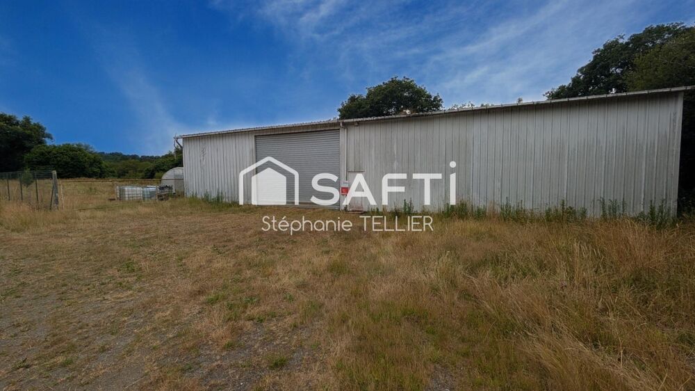 Vente Terrain Sur le Secteur de Callac Terrain avec une partie constructible + hangar Callac