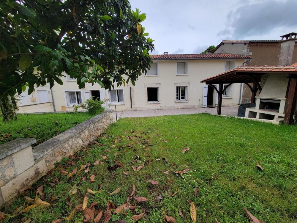 Maison avec deux logements garages jardin