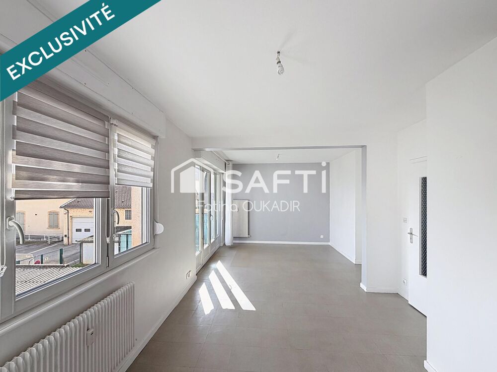 Appartement à DEUX MINUTES À PIED DE LA GARE avec balcon, cave et GARAGE.