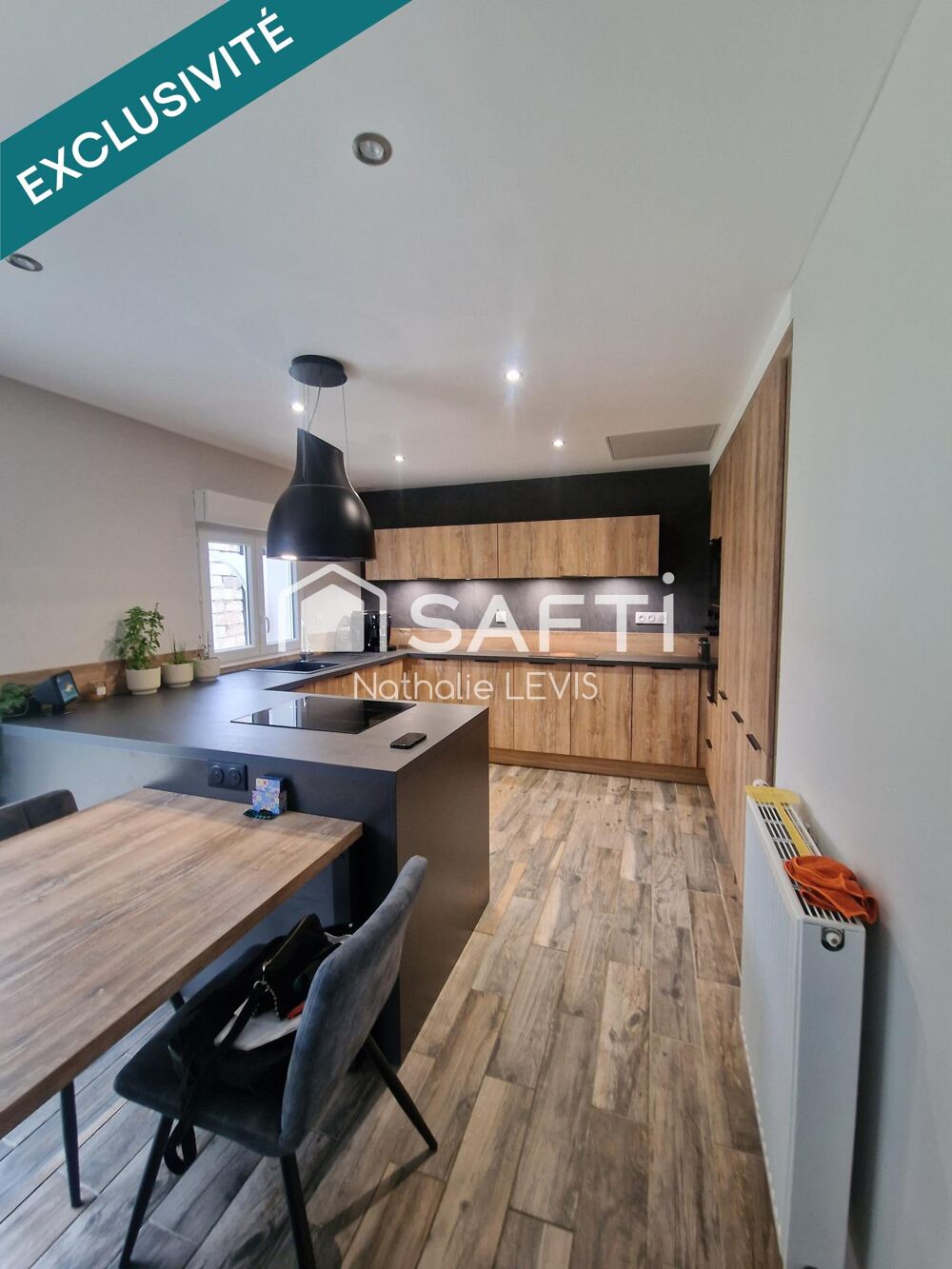 Vente Maison Maison mitoyenne sans aucun travaux  avec 2 stationnements privés, un jardin,  dans un quartier calme Avion
