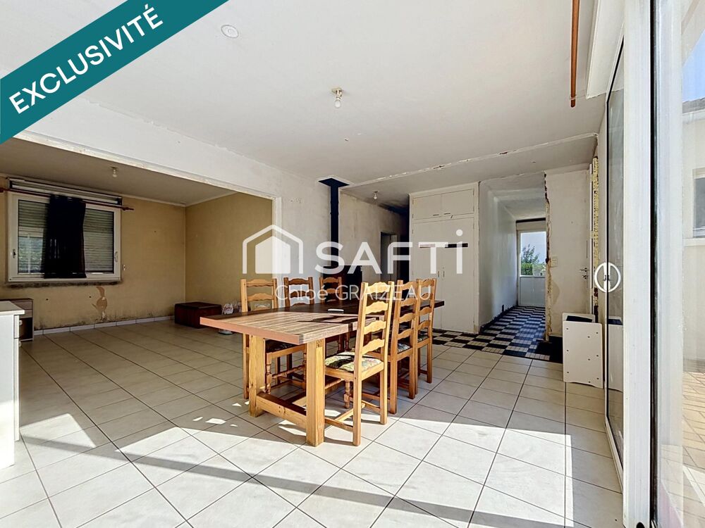 Maison sur demi-sous-sol, 84 m² habitables, terrain constructible