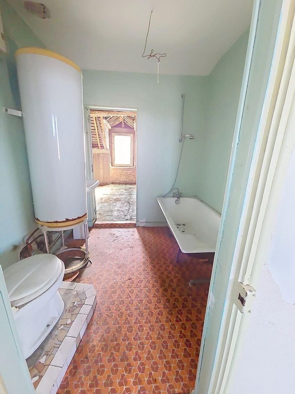 Un petit coin de paradis, la maison en ville, la rivière en fond du jardin ,