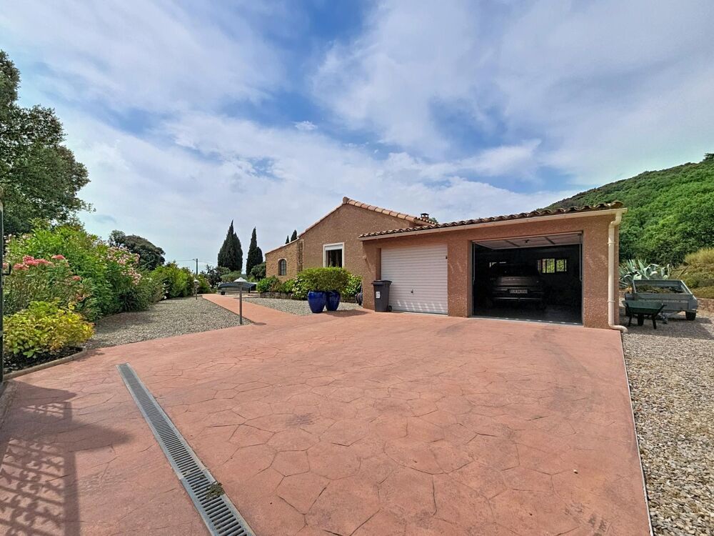 Vente Maison Une villa familiale de plain-pied au cœur d'un véritable écrin de verdure, sans vis-à-vis, dans un environnement privilégié. La tour-sur-orb