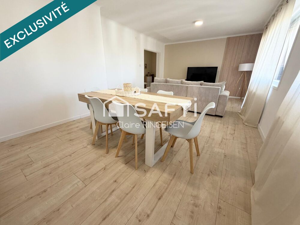 Appartement rénové de 89m2 avec terrasse, cave et garage