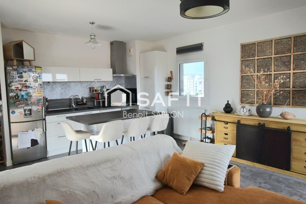 Appartement récent 54m², balcon, stationnement
