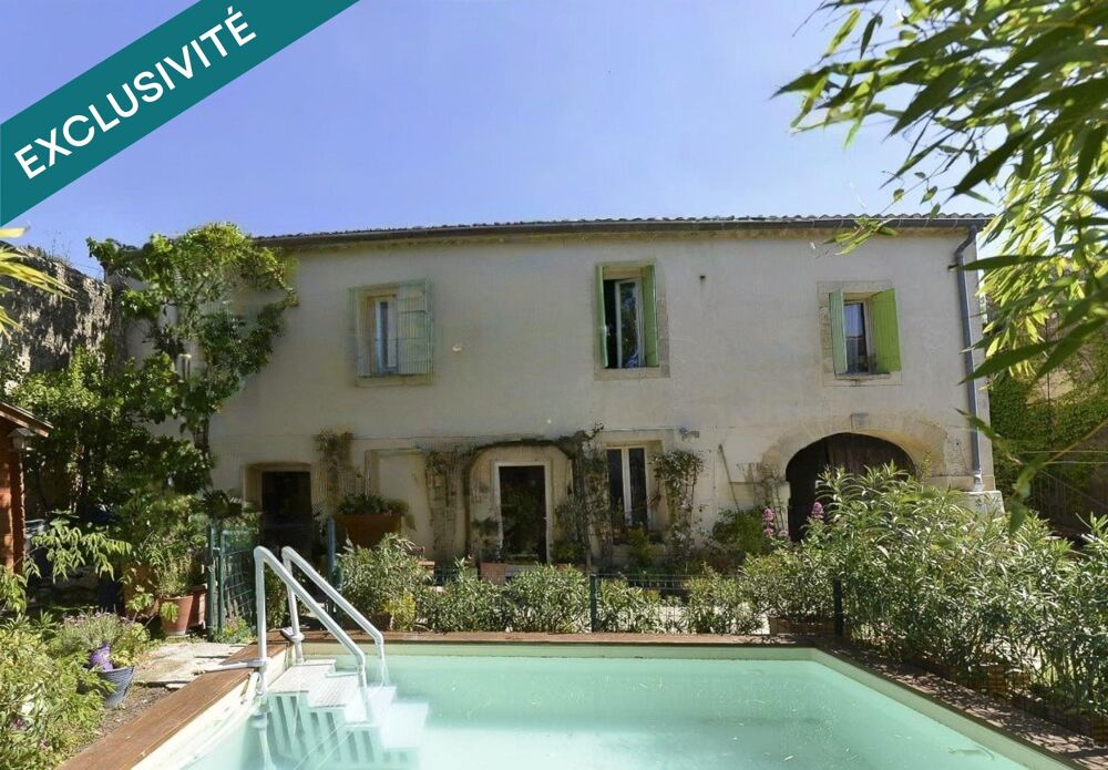 Maison de village de 182m² avec piscine, 4 chambres, garages.