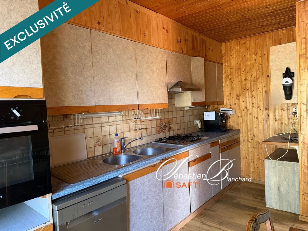 Maison mitoyenne avec beau terrain de 825 m²  à personnaliser