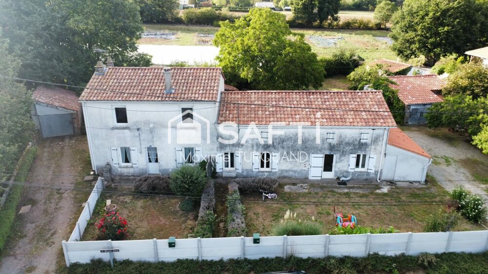 Vente Immeuble Ensemble immobilier comprenant 2 logements dont 1 loué + terrains + dépendances. Saint-mesmin