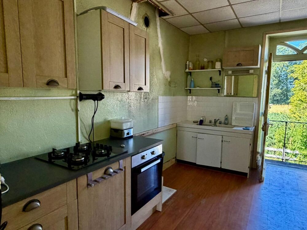 Maison d'habitation sur 2 niveaux avec sous-sol