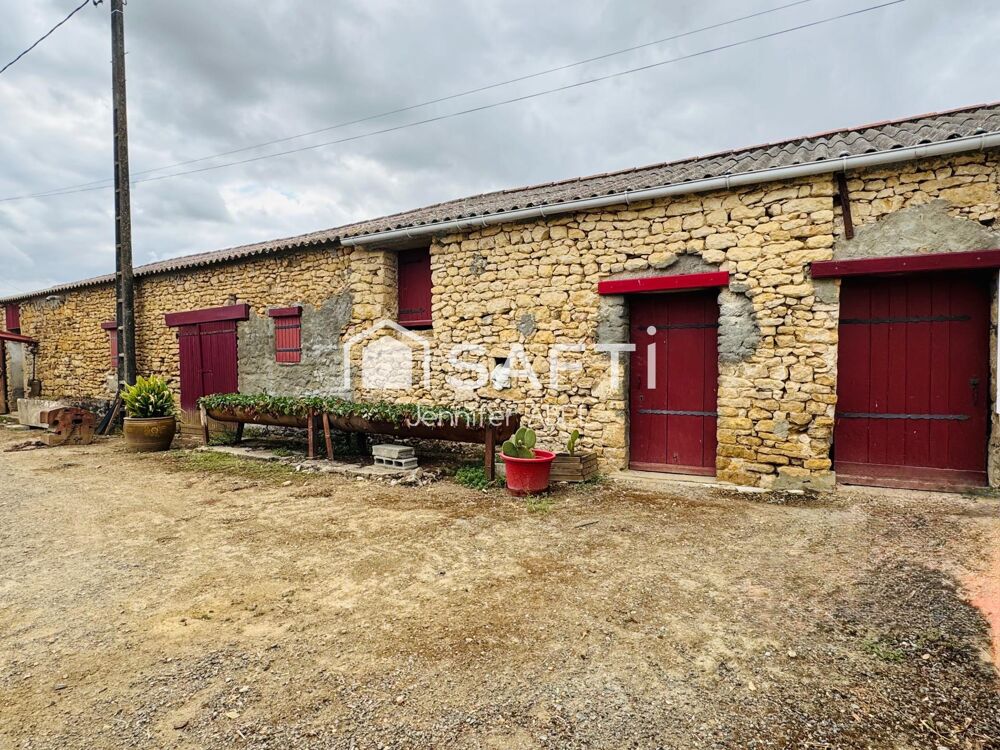 Maison avec nombreuses dépendances et fort potentiel