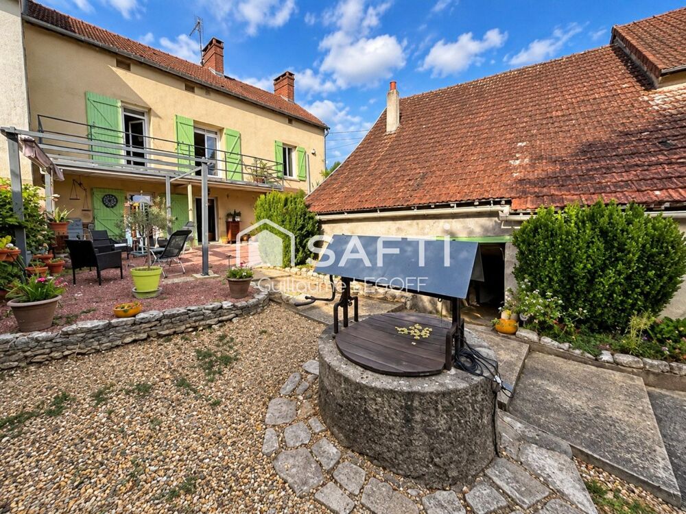 Maison rénovée, terrain 2 400 m² et dépendances