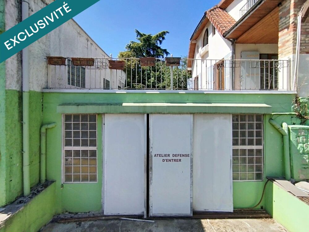 Maison de 7 pièces avec bâtiments commerciaux