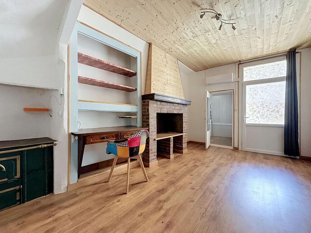 Une grande maison familiale entièrement rénovée, avec terrasses, garage et de beaux volumes au coeur de Graissessac.