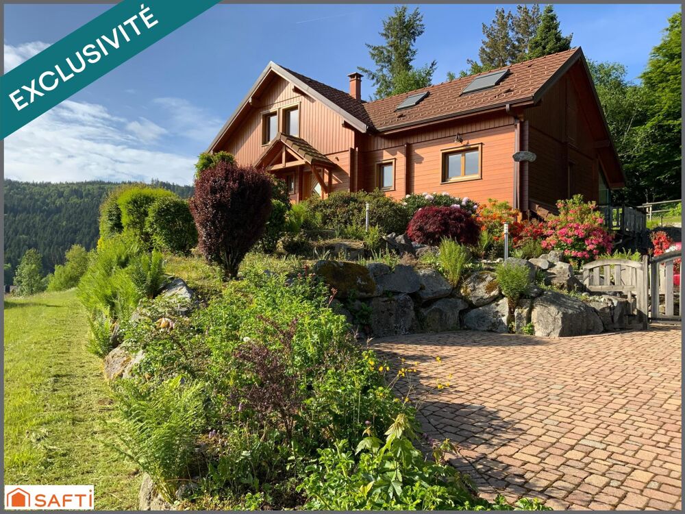 Chalet d'exception avec grand terrain paysagé de 2000 M2 , proximité des pistes et de la nature, emplacement rare.