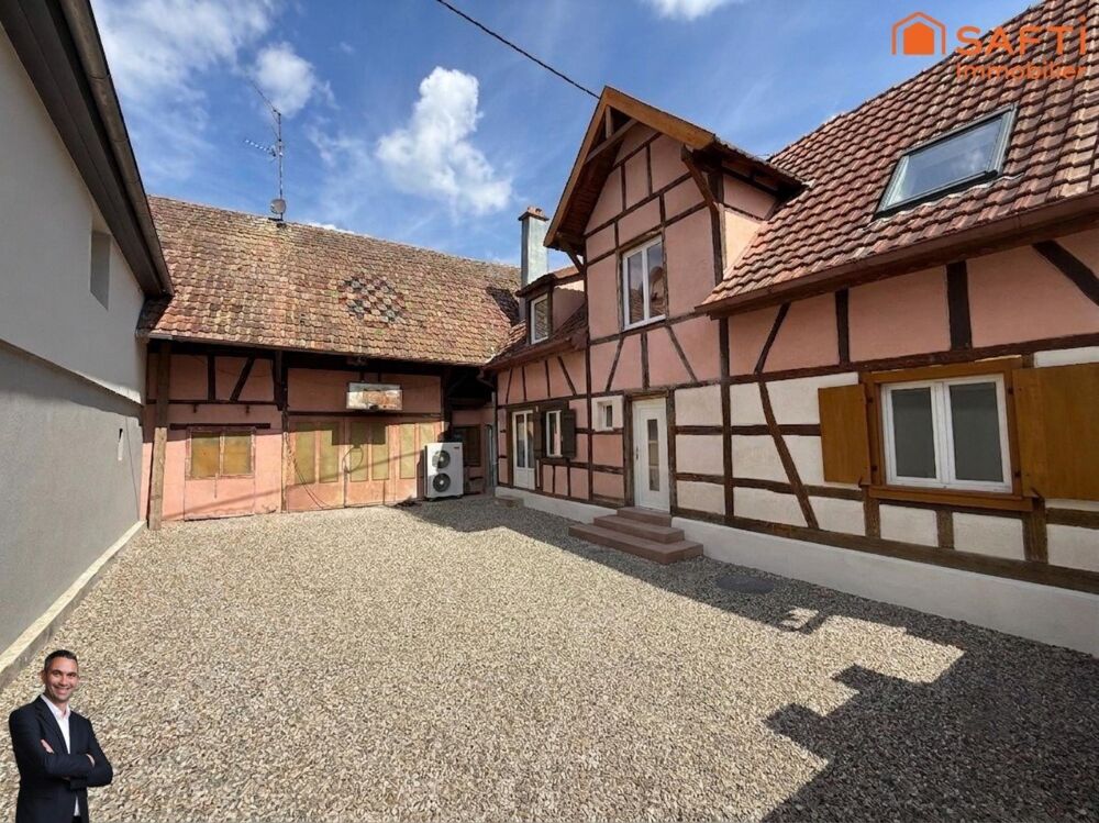 Jolie maison Alsacienne à finir d'aménager, disposant d'une grande cour et d'une dépendance !