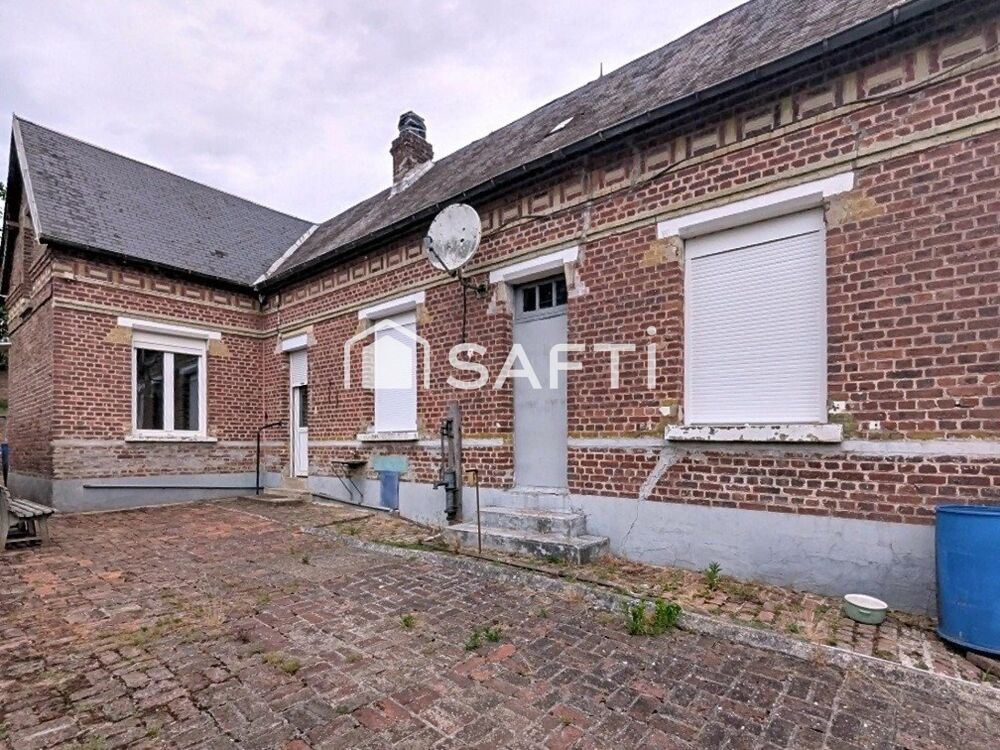 Charmante maison ancienne en briques avec beau potentiel